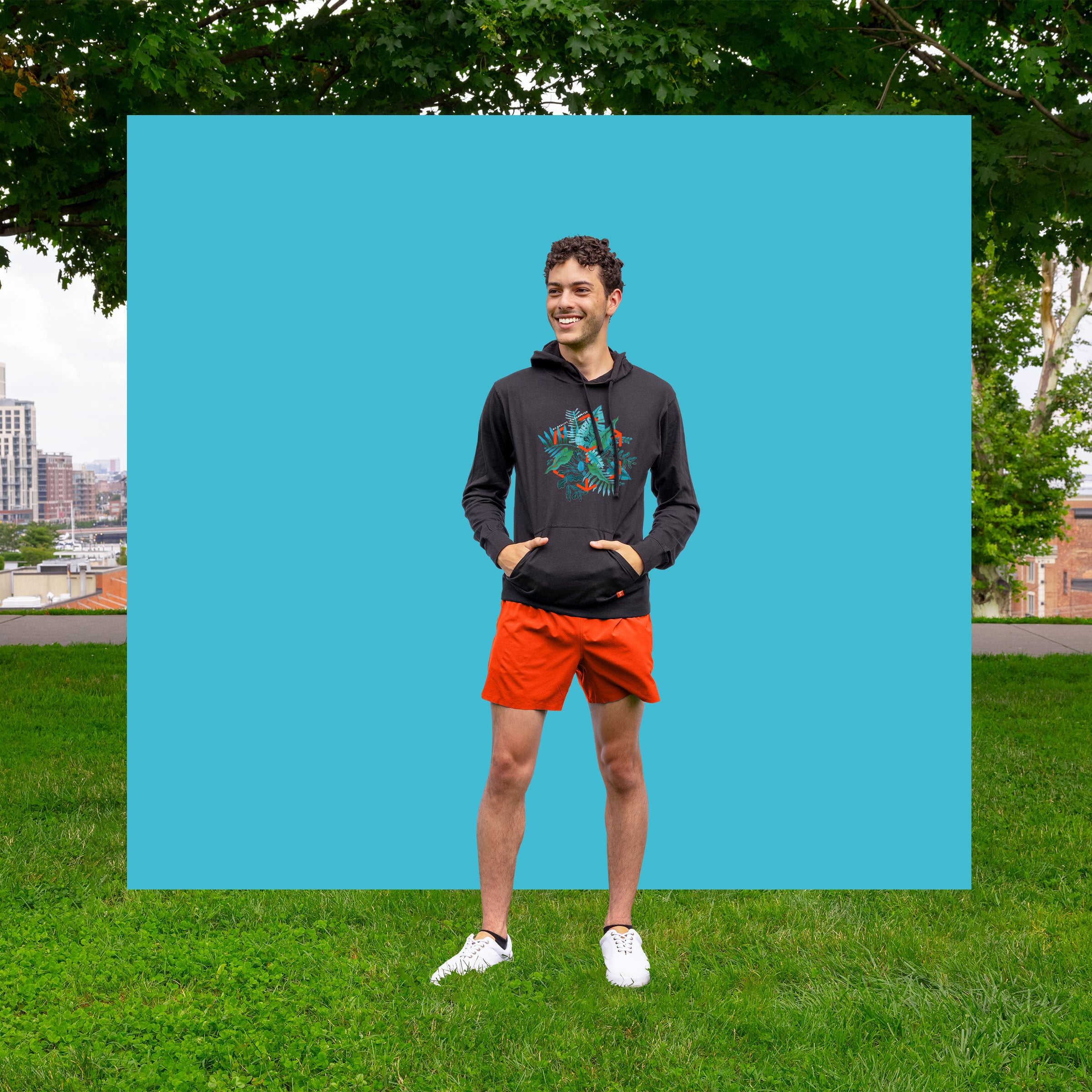 niantic exploration ar pullover hoodie on model in front of blue square